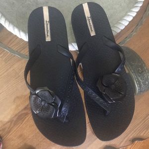 Ipamema  Black flip flops.